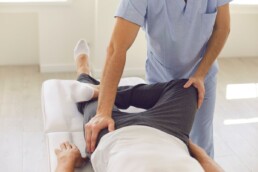 physical therapist with patient
